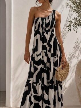 lily in the blue dress Block Print Floral Navy Floral / x-small Width:W 100% Polyester Made in andrea-grace Black Cotton Blend Logo